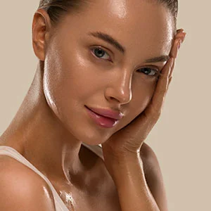 Woman receiving facial treatment