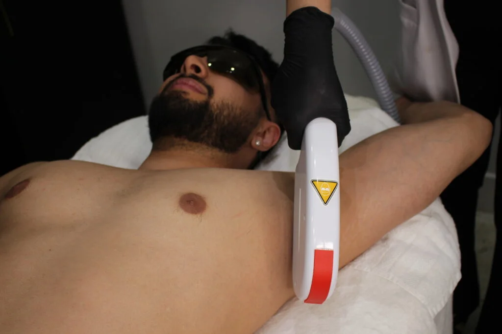 Woman receiving facial treatment