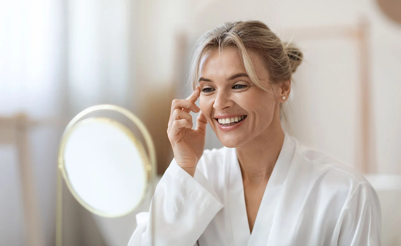 Woman receiving facial treatment