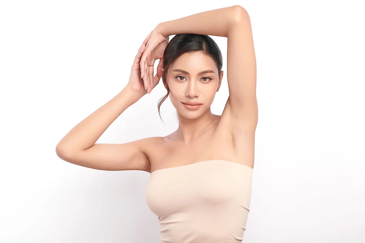 Woman receiving facial treatment