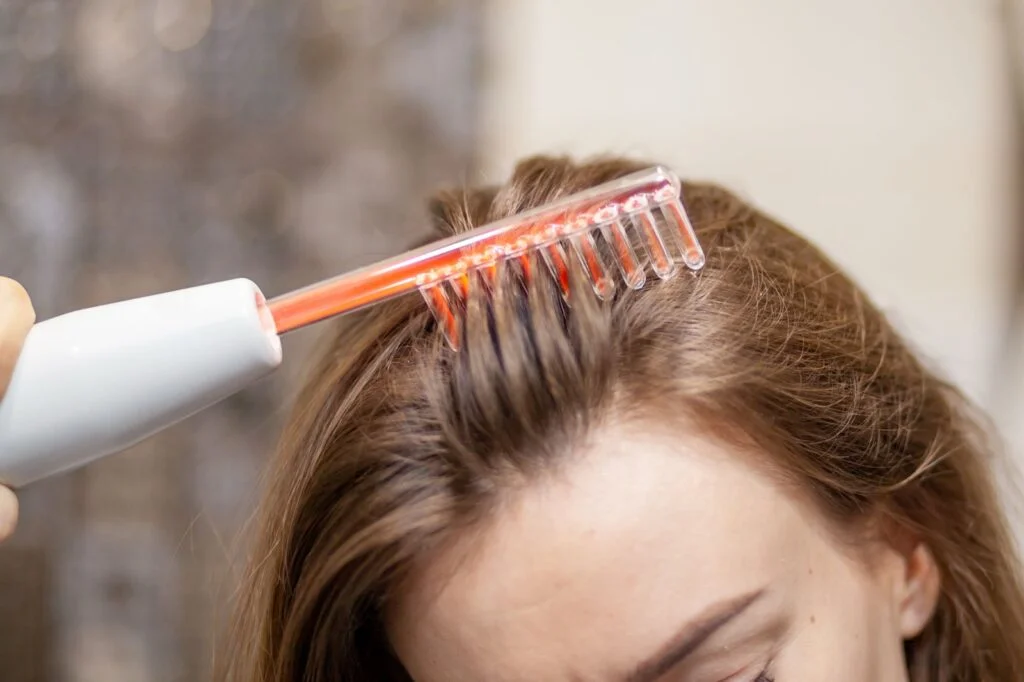 Woman receiving facial treatment