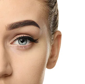 Woman receiving facial treatment