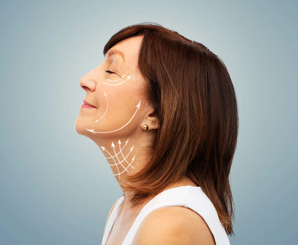 Woman receiving facial treatment