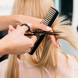 Woman receiving facial treatment