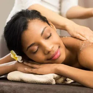 Woman receiving facial treatment